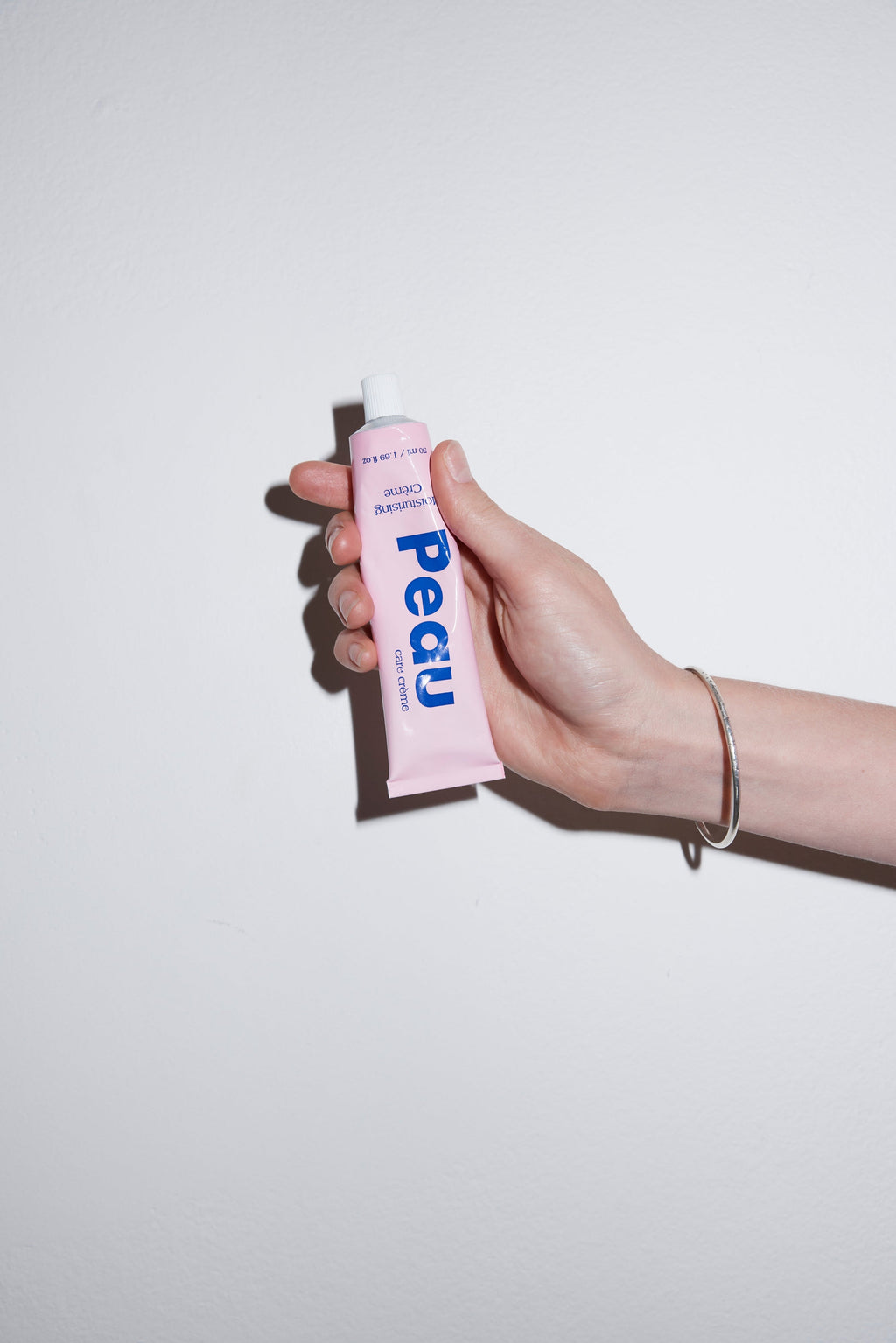 Peau Moisturising Crème, a fragrance-free barrier-repair cream for dry and sensitive skin, doubles as a makeup primer.